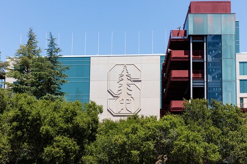 Stanford University campus building with logo